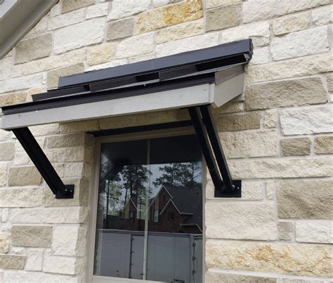 metal roof overhang brackets|firmly settled ornamental bracket.